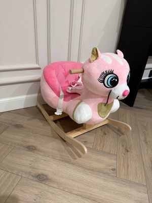 Детская игрушка качалка