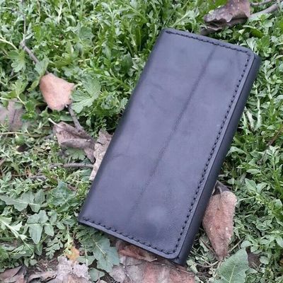 Кожанный бумажник из натуральной кожи, сделан в ручную.