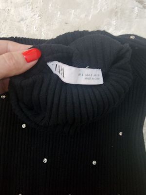 водолазка Zara.