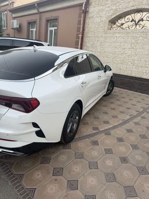 Kia K5 белый жемчуг