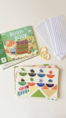Большая развивающая книга с липучками на английском языке «Busy book»