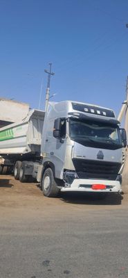 HOWO A-7 тягач ва прицеп тезда ва арзон нархда сотилади