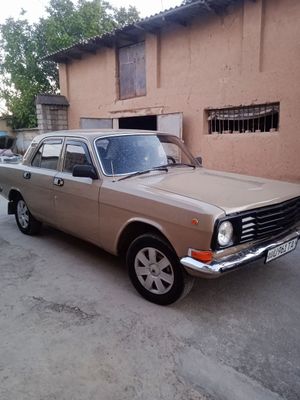 Автомобиль газ 2411