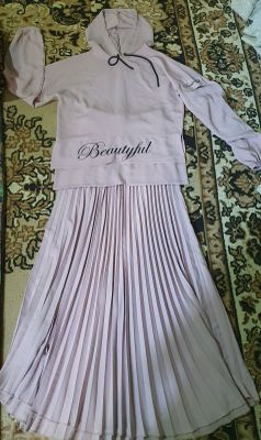 Pushti ayollar kiyimi