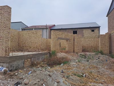 Урганч шахрида курилиши тугалланмаган жой сотилади