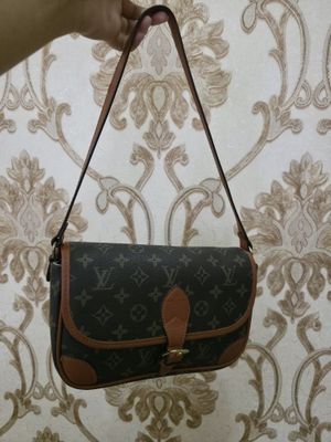 Louis Vuitton таза усталган