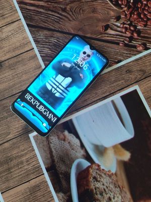 Itel A70 3+2ga128 hotira orqa kamrr 13 mp oldi kamera 8mpp