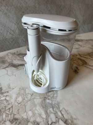 Очистка зубов Waterpik water flosser