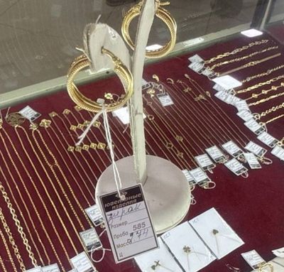 Продам золотые серьги