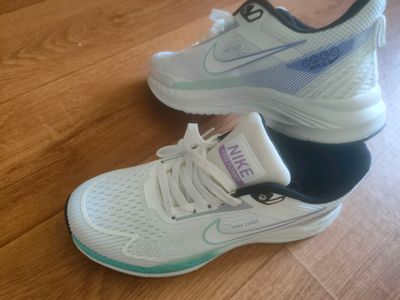 кроссовки женские фирмы Nike