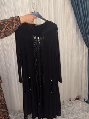 Bu cardigan turkiyaniki. Atigi bir marta kiyilgan.