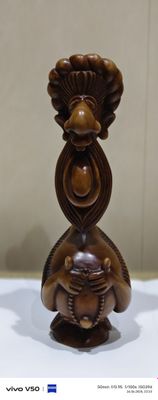 Резная фигура Восточный старец с чётками.
