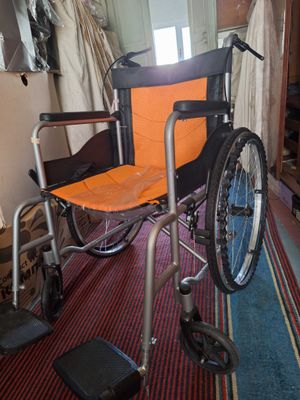 Invalidniy kolyaska i urna