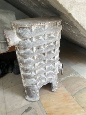 Чугуная печка для дома