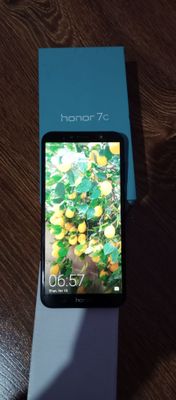 HONOR 7C. Holati zoʻr . Bluts naushnik va eliktron soati bilan. bir qo