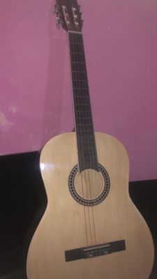 Gitara cholnishga gap yoq sozlangan
