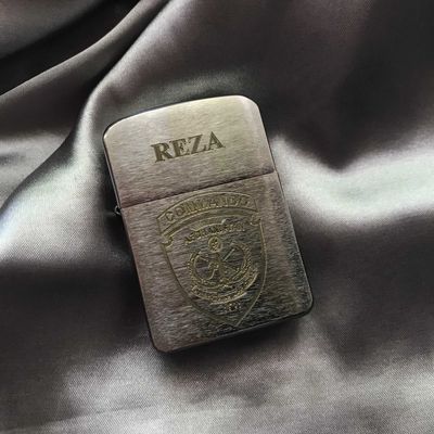 Зажигалка Zippo .