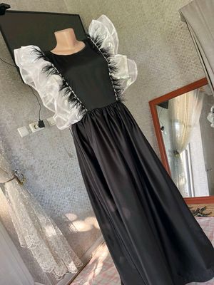 biror marta kiyilmagan vecherniy koʻylak