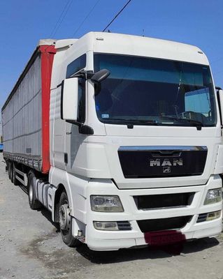 Тягач MAN TGX 2011 йил, автомат КПП, прицеп фрейхауф саф мост, 2009 й