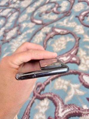 S20 ultra xotira 256.faqat 100x kamerada shang bor