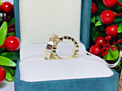 серьги-кольца модели BVLGARI, литые