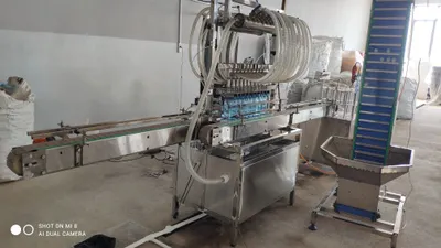 Сув куйиш линияси. дозатор, розлив