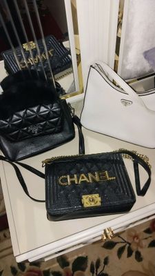 sumkalar brendoviy Prada Chanel 200 olingan 50.000