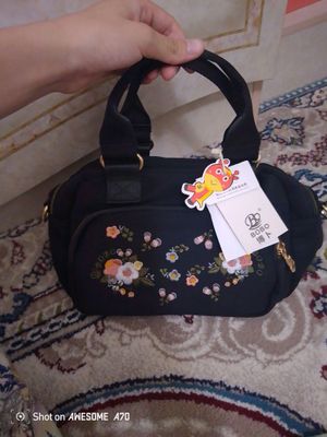 Sumka yengi 100 minga beraman
