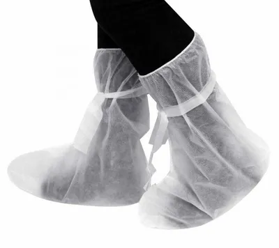 Высокие бахилы из спанбонда. нетканный материал. спанбонд бахилы