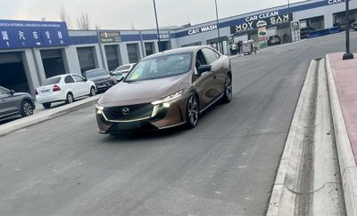 Mazda ez6 гибрид 1300 км.