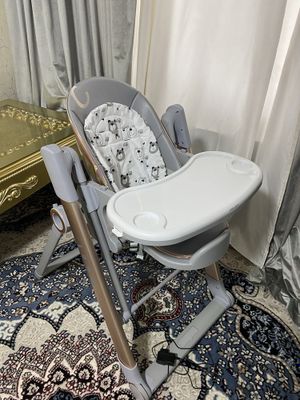 Chaqaloqlar uchun stul va arğimchoq elektron stul