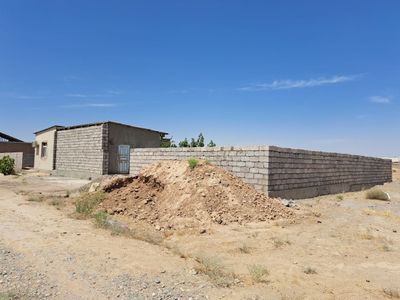 Термиз туман сентир камаздан 4 хонали 4 сотихли ховли срочна сотилади.