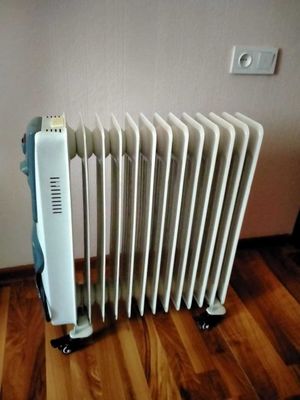 Масляный обогреватель