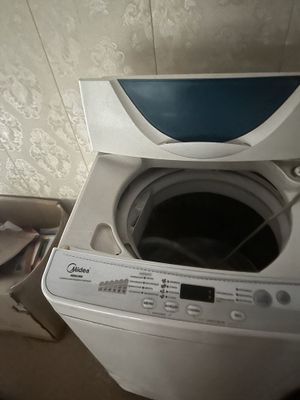 Kir mashina midea