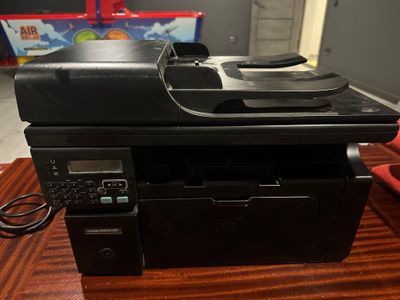 Принтер HP LaserJet M1212nf MFP