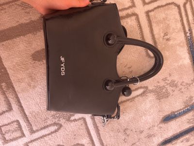 Qora sumka,toza kojadan.2 martta ishlatilgan yangi