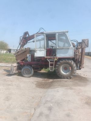 Карпатец, экскаватор погрузчик.