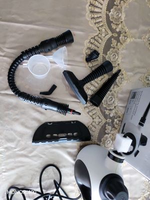 HANDHELD STEAM CLEANER