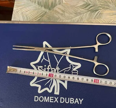 Гинекологический зажим / ножницы