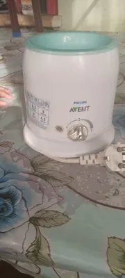 Продается подогреватель для бутылочек.