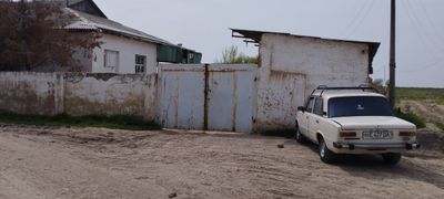 Тошкент вилояти Бука туман марказий шифохонаси орка томонида дача