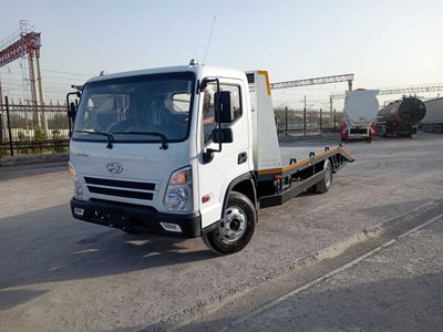 Эвакуатор с ломаной платформой HYUNDAI EX8 3,5 т