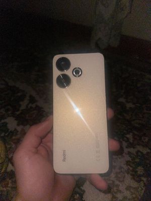 Redmi 13 rangi gold holati ishlashi yaxshi orqasida kichkina sinig bor