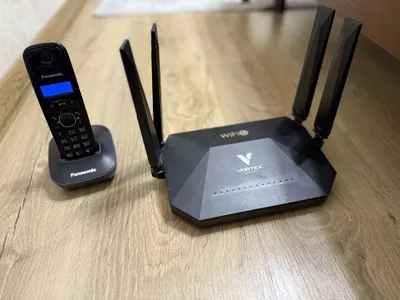 Прожаю свой роутер и домашний телефон panasonic