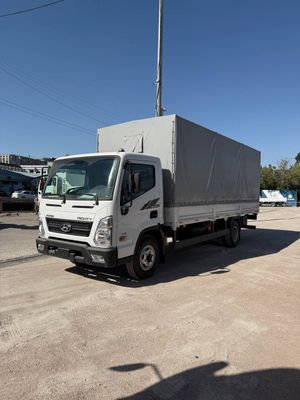 Бортовой тентовый  фургон HYUNDAI EX8