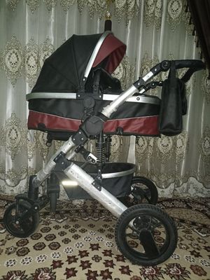 Новый коляска Кожнный