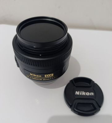 Nikon abektif xolati idyal