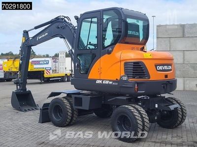 Экскаватор Develon DX60W eco 2025