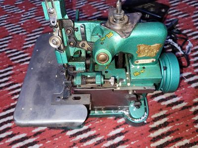 Averlok tikuv mashinasi Ishlashi Alo dkuarajada 3 ta ip ketadi Chok