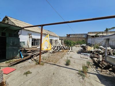 Текстилда 5.5 сотихли ер сотилади.